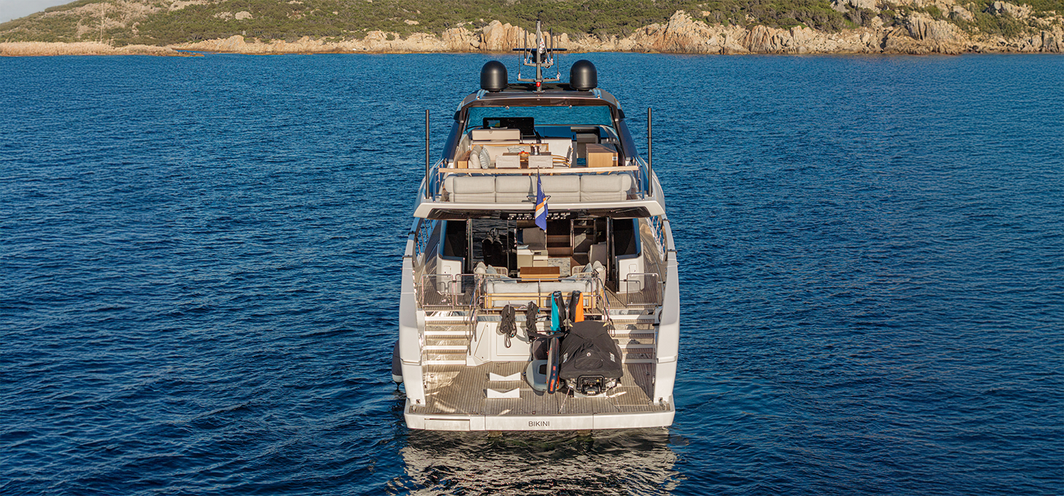 Exterior running shot of the motor yacht Firefly's beach club entrance