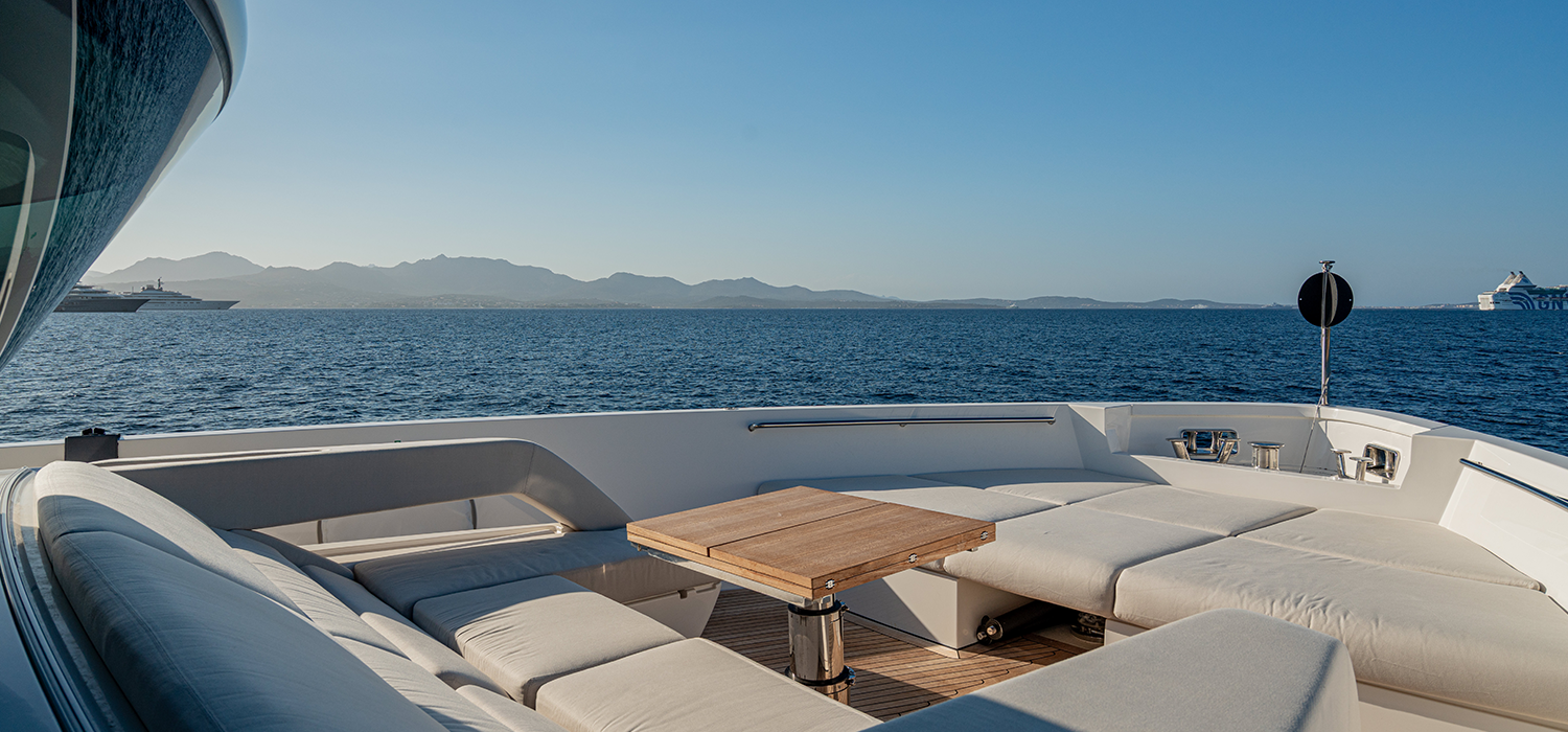 The foredeck on board luxury motor yacht Firefly, in the sun with blue sky
